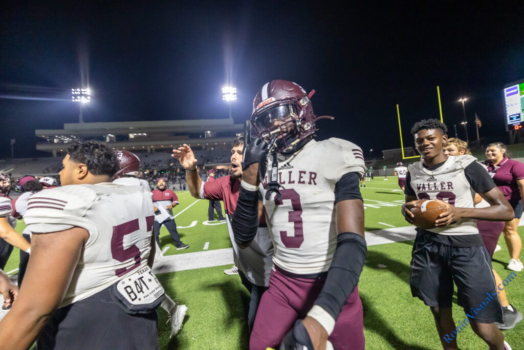 Curtis Gooden (3) celebrates after returning an interception 85 yards, putting the Bulldogs up, 21-0. The Waller Bulldogs break their losing streak with a victory over Katy Mayde Creek’s Rams, 35-0, at Legacy Stadium, Saturday, Sept. 2, 2023. (Photo courtesy RoninVisuals.com)
